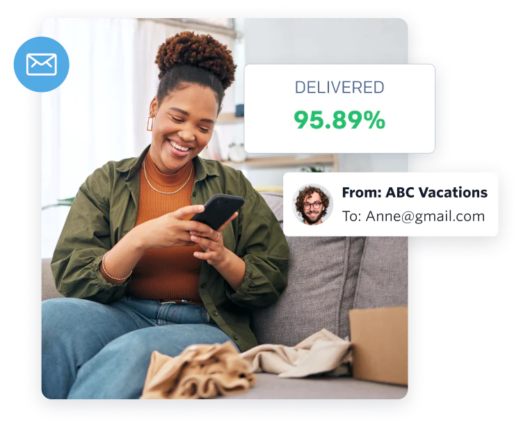 Woman smiling at phone on couch with email delivery notification overlay and email sender details.