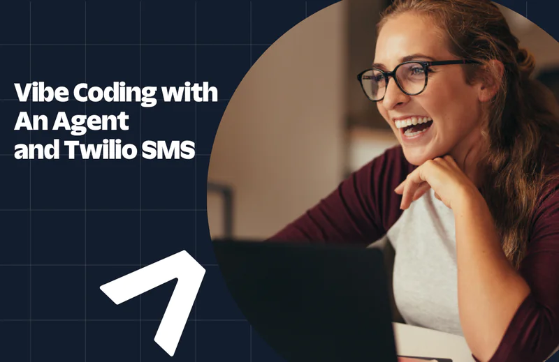 Woman with glasses coding on a laptop with text